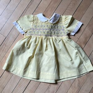 Vintage baby girl yellow dress with smocking and embroidery Peter Pan collar